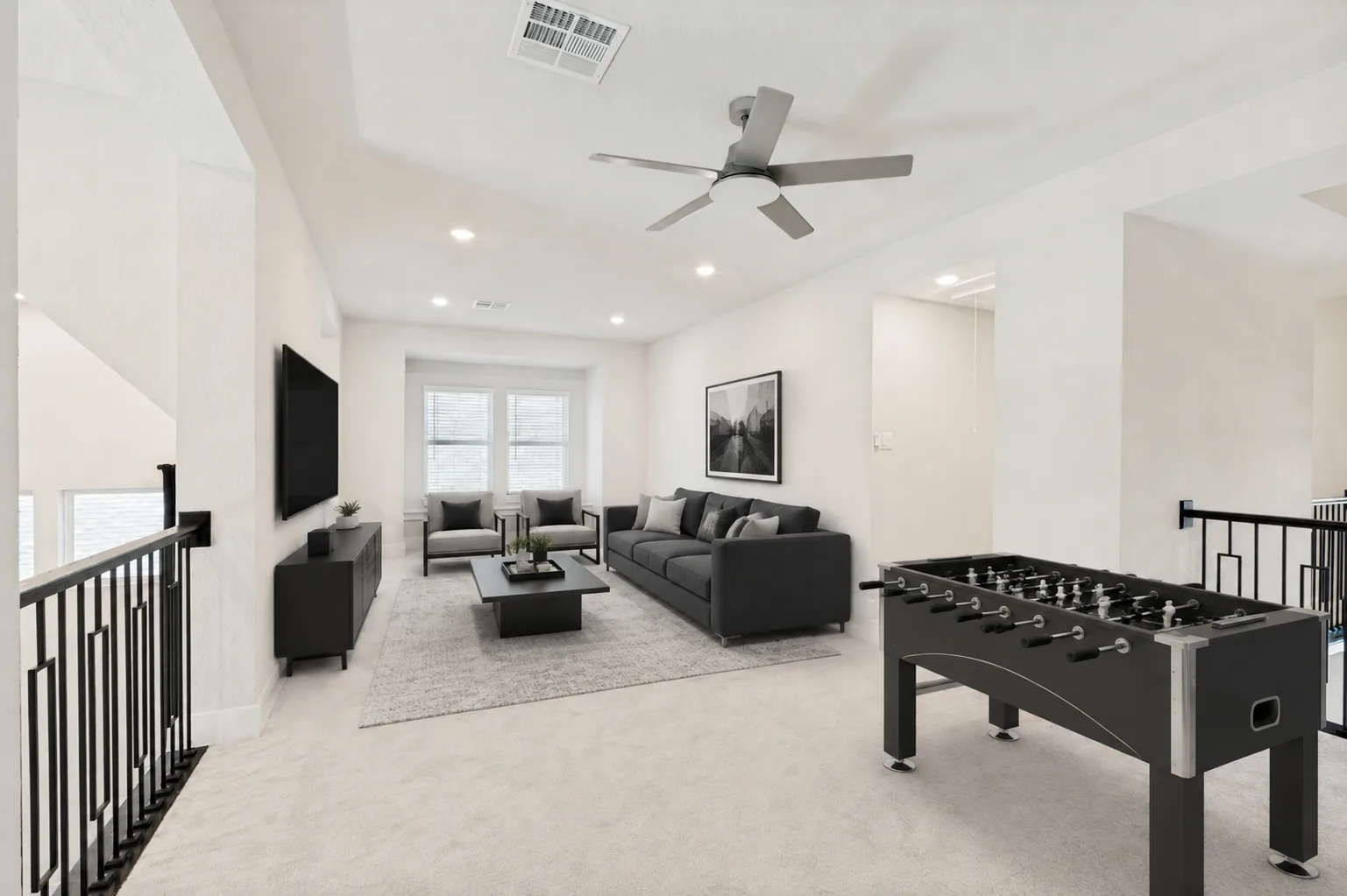 Upstairs media and game area, virtually staged