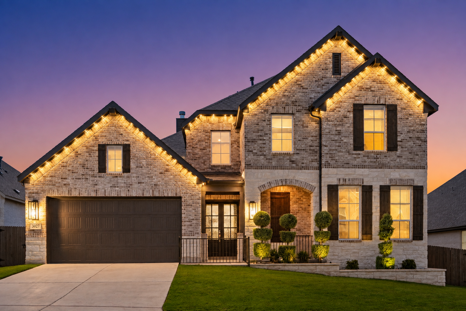 Full exterior of 3027 Daplyn Park with permanent holiday lighting